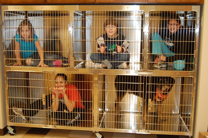 KIDS IN CAGES 